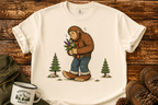 Bigfoot Lumberjack Graphic T-Shirt — Sasquatch Holding Pinecone Design